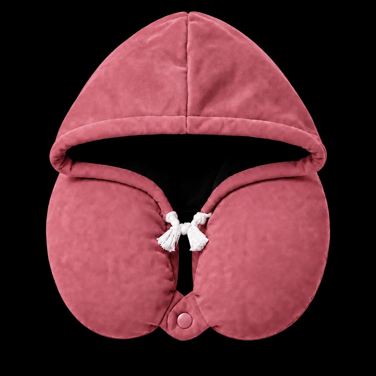 The soft neck pillow and attached hood in Dusty Rose